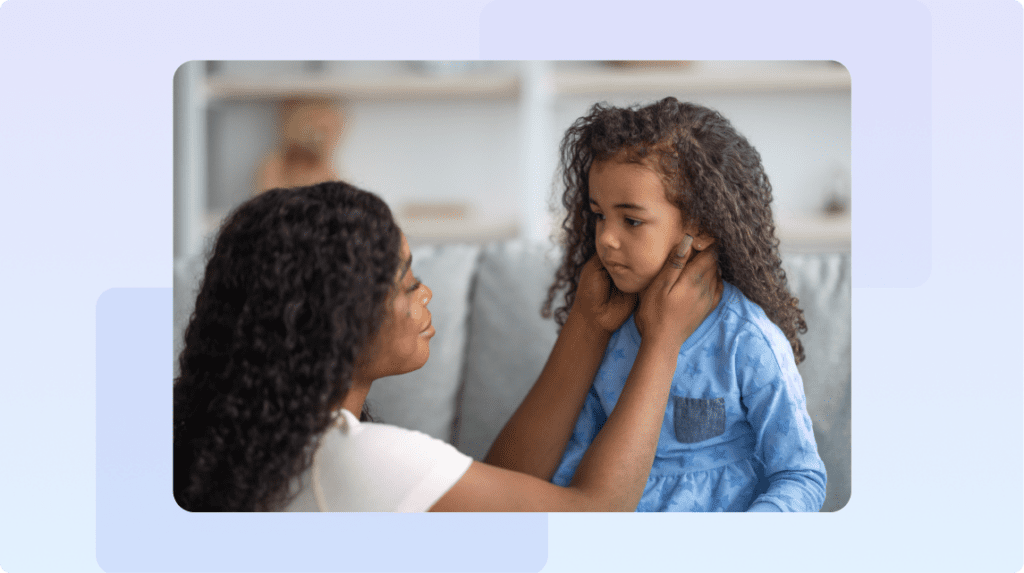 Parent comforting their child.