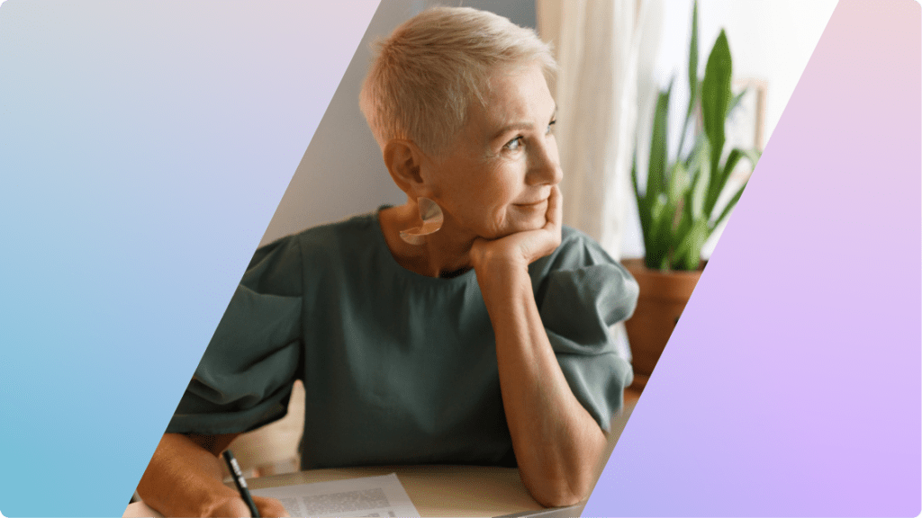 A woman smiling and looking to the side