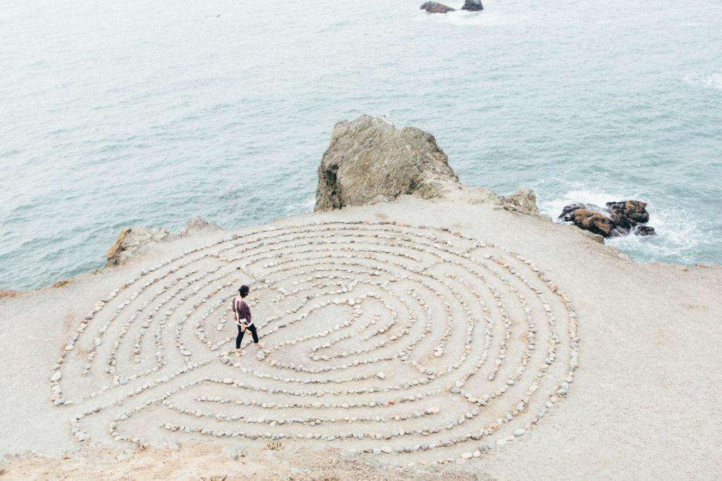 A man walking through a maze