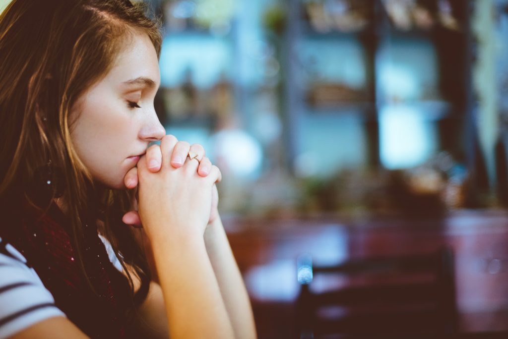 A girl confessing after doing blasphemous act