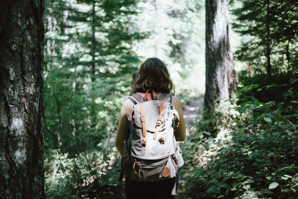 A woman walking in the jungle