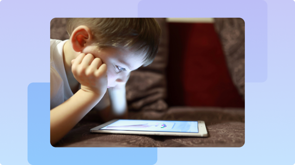 child watching an ipad